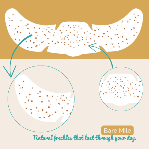 Začasne drobne rjave pegice v naravni, nežni razporeditvi.
